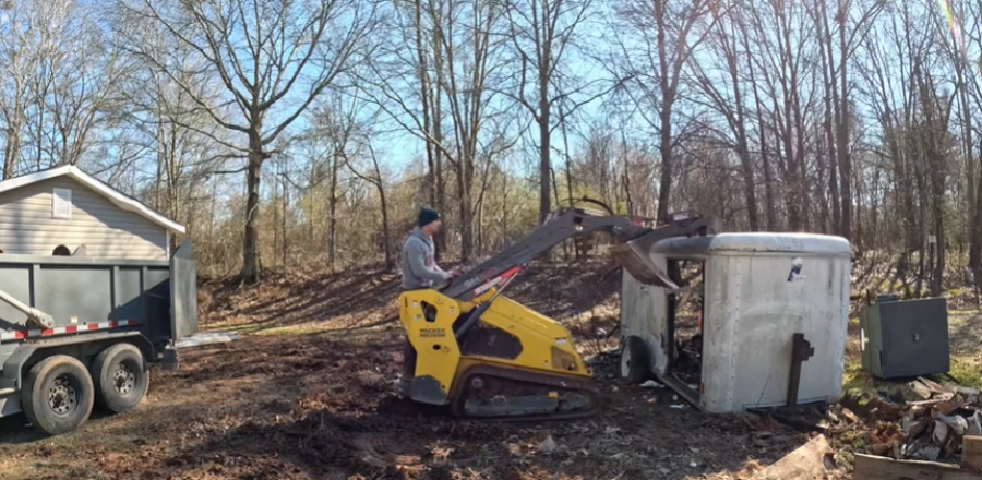Storm branches and yard debris removed from an Evansville property